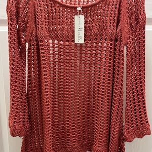 Burnt Orange open-knit sweater.